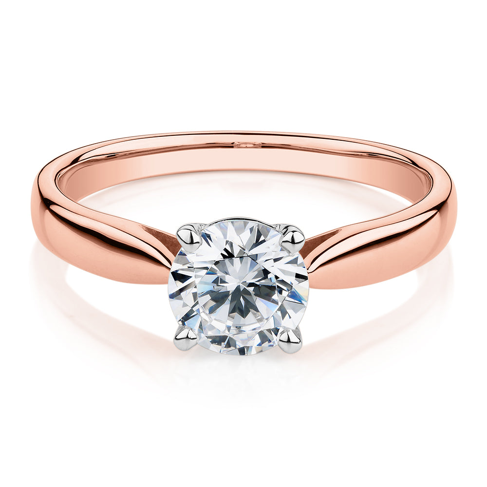 Round Brilliant solitaire engagement ring with 1 carat* diamond simulant in 10 carat rose and white gold