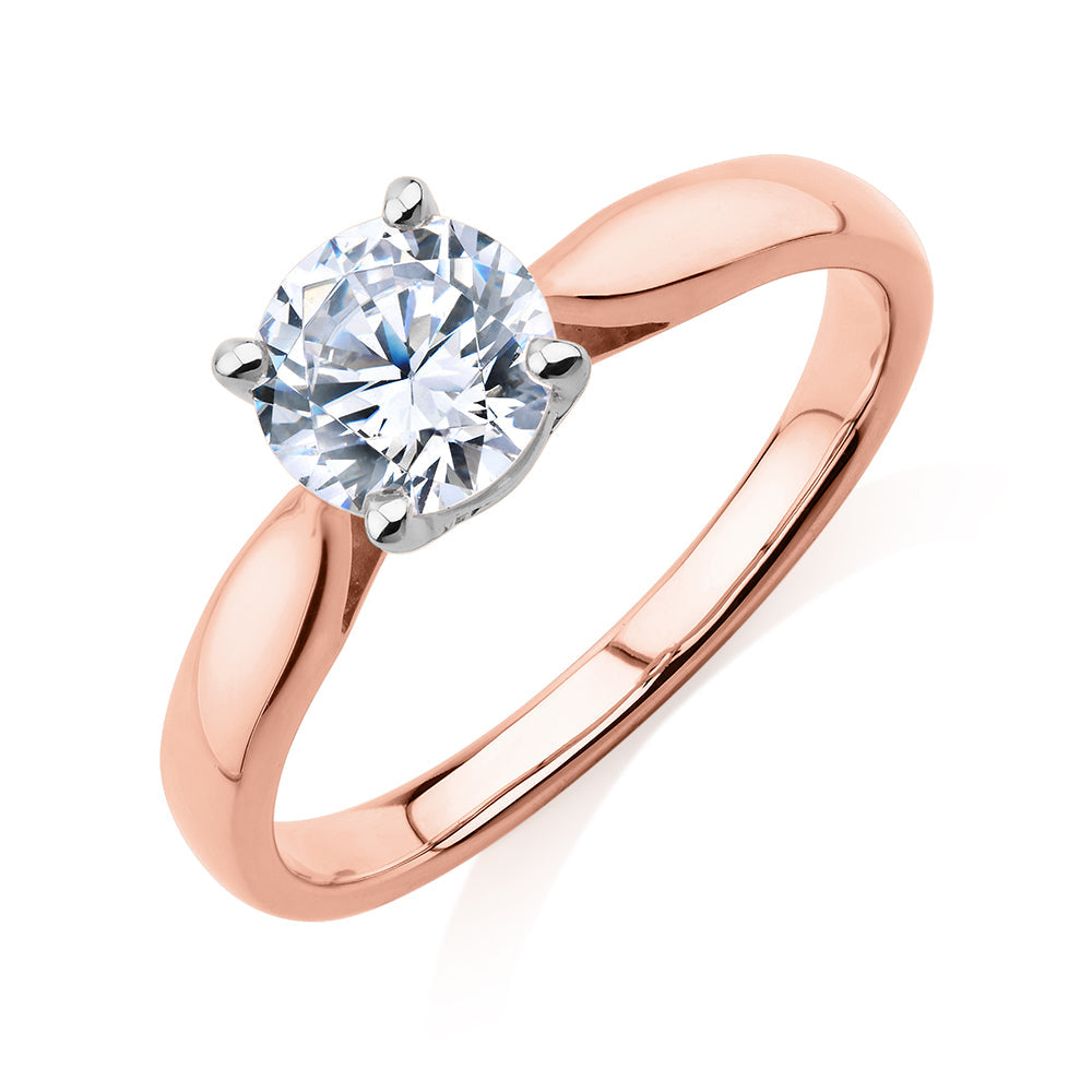 Round Brilliant solitaire engagement ring with 1 carat* diamond simulant in 10 carat rose and white gold