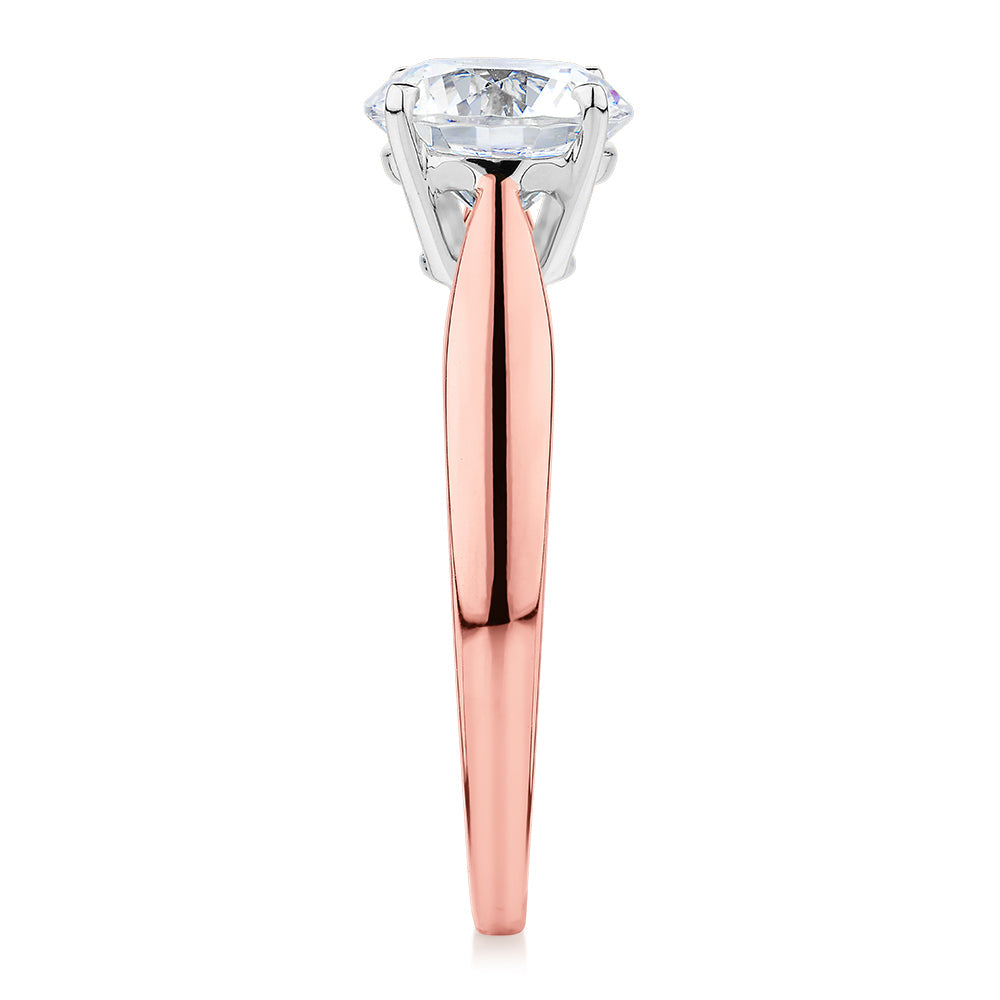 Round Brilliant solitaire engagement ring with 1.5 carat* diamond simulant in 14 carat rose and white gold