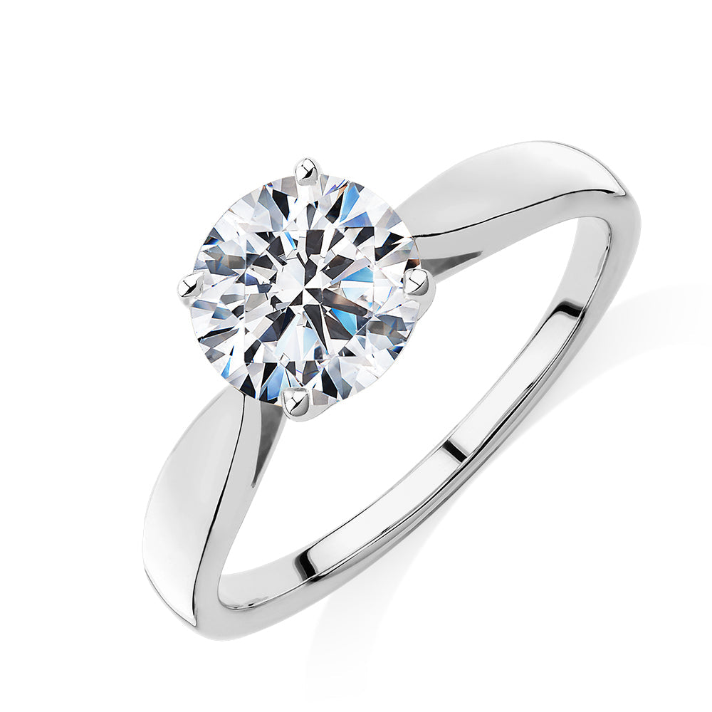 Round Brilliant solitaire engagement ring with 1.5 carat* diamond simulant in 14 carat white gold