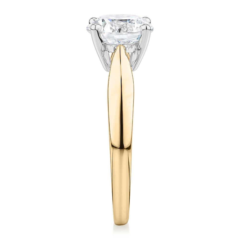 Round Brilliant solitaire engagement ring with 2 carat* diamond simulant in 14 carat yellow and white gold