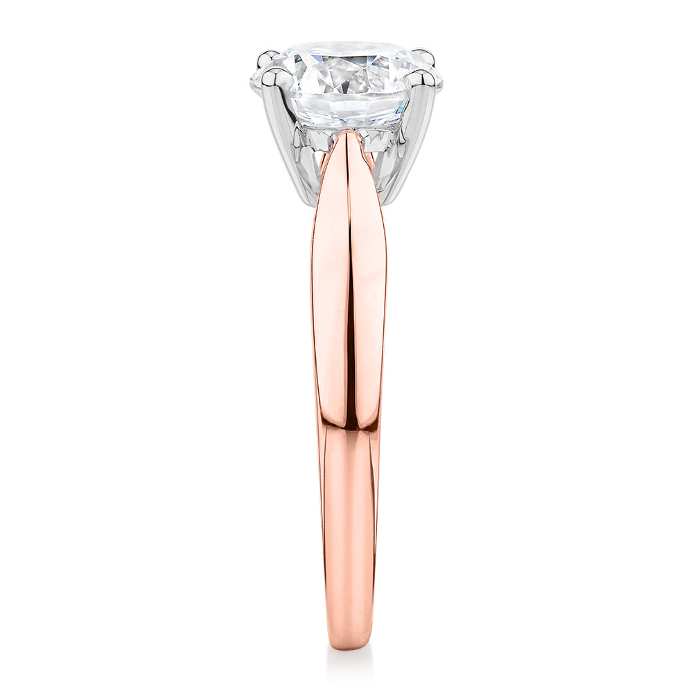 Round Brilliant solitaire engagement ring with 2 carat* diamond simulant in 14 carat rose and white gold