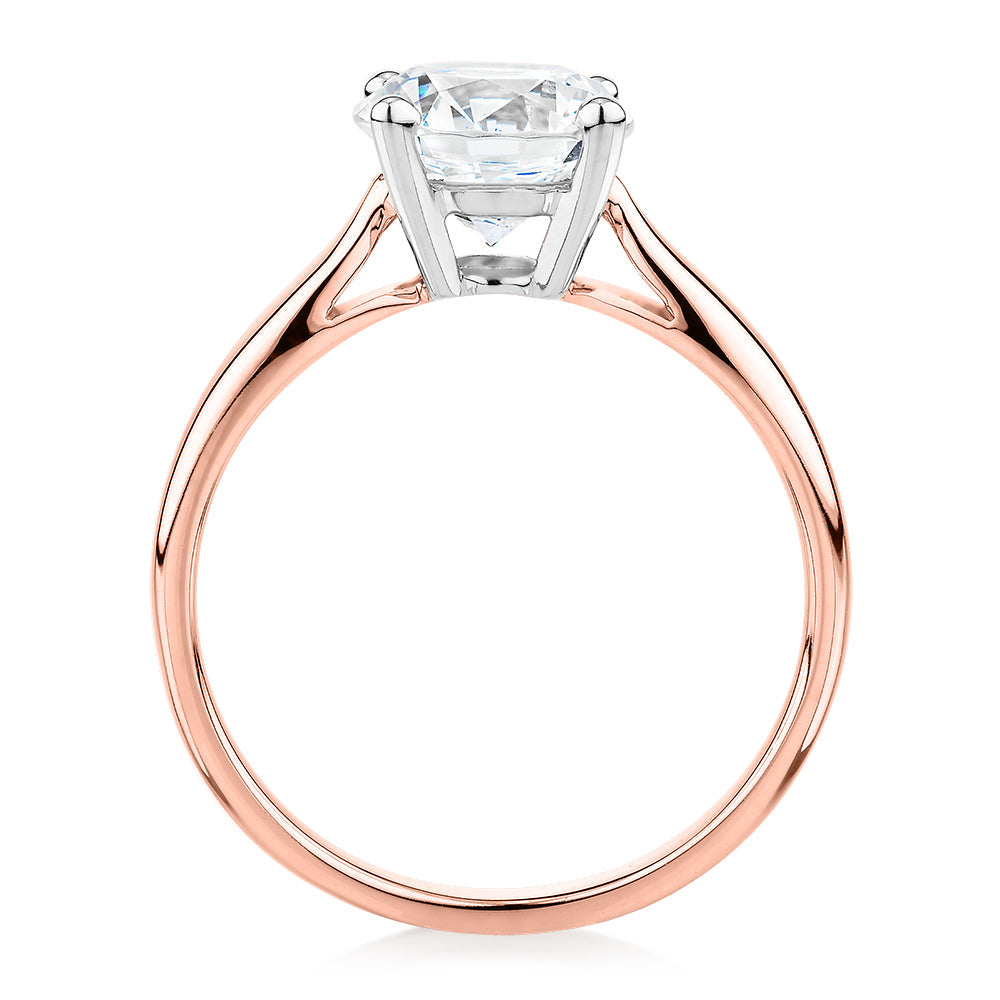 Round Brilliant solitaire engagement ring with 2 carat* diamond simulant in 14 carat rose and white gold