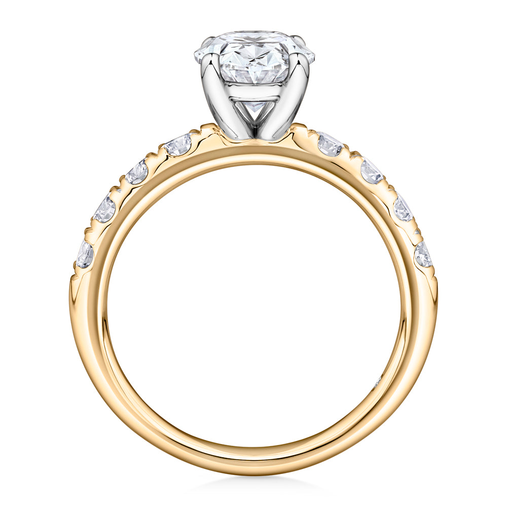 Lab-Grown Simulant, 2.62 carat*TW oval and round brilliant shouldered solitaire engagement ring in 10 carat yellow and white gold