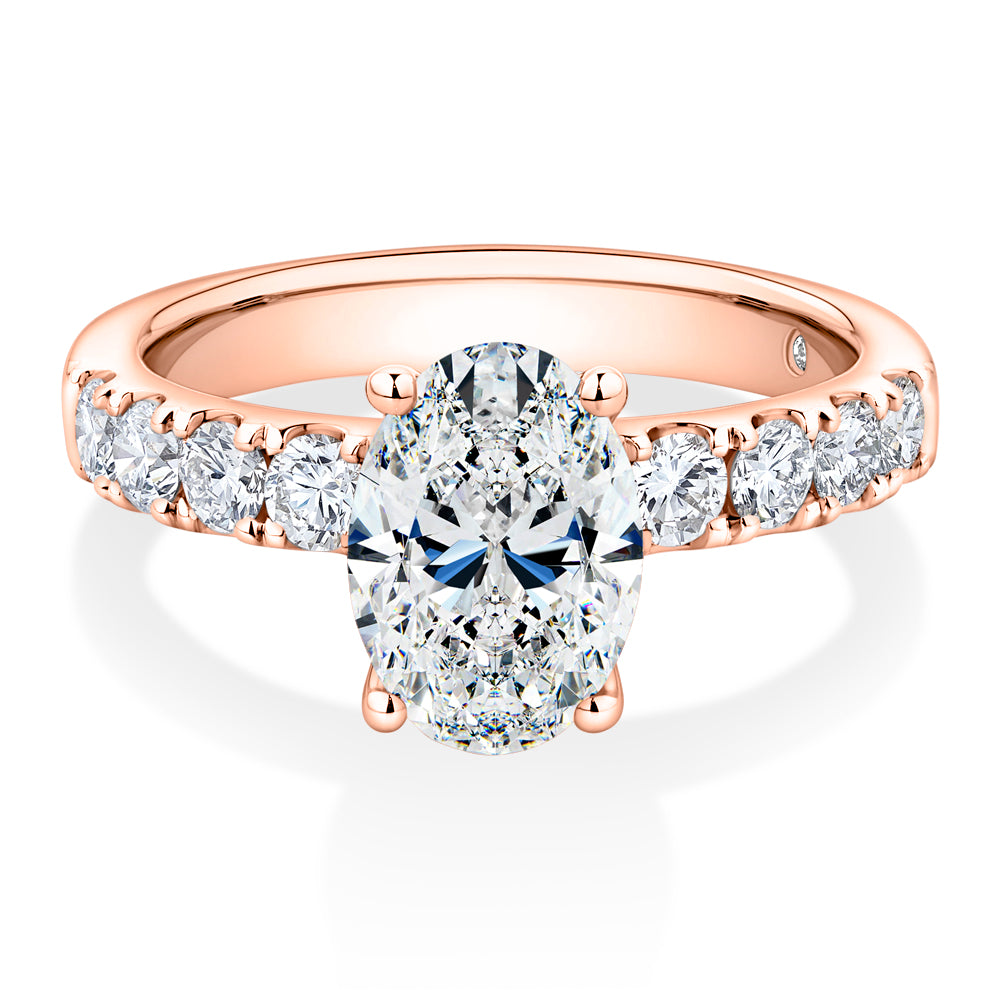 Lab-Grown Simulant, 2.62 carat*TW oval and round brilliant shouldered solitaire engagement ring in 10 carat rose gold