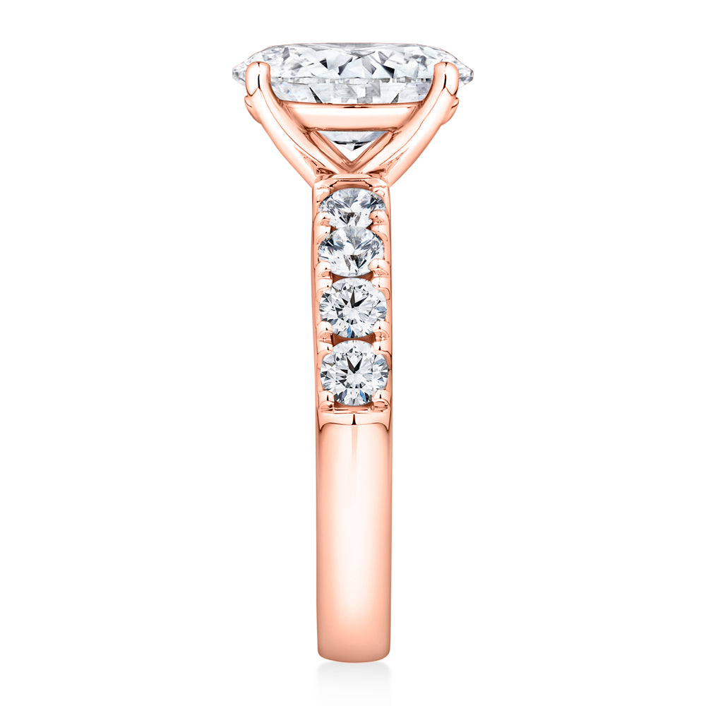 Lab-Grown Simulant, 2.62 carat*TW oval and round brilliant shouldered solitaire engagement ring in 10 carat rose gold