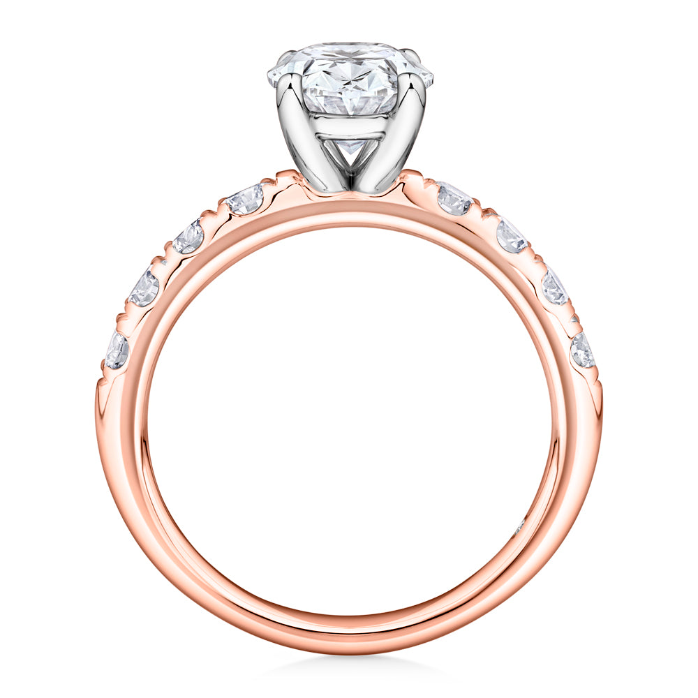 Lab-Grown Simulant, 2.62 carat*TW oval and round brilliant shouldered solitaire engagement ring in 10 carat rose and white gold