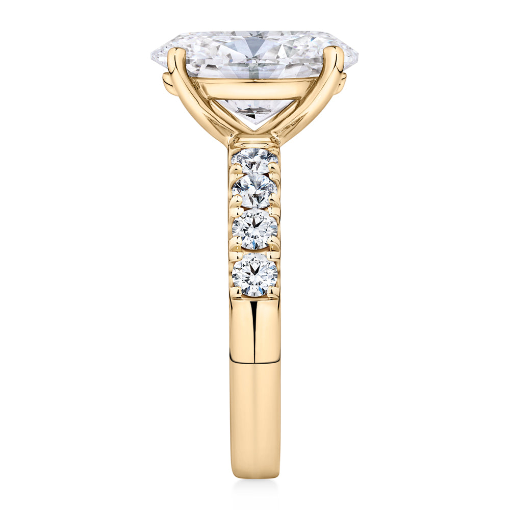 Certified Lab-Grown Diamond, 4.62 carat TW oval and round brilliant shouldered solitaire engagement ring in 14 carat yellow gold