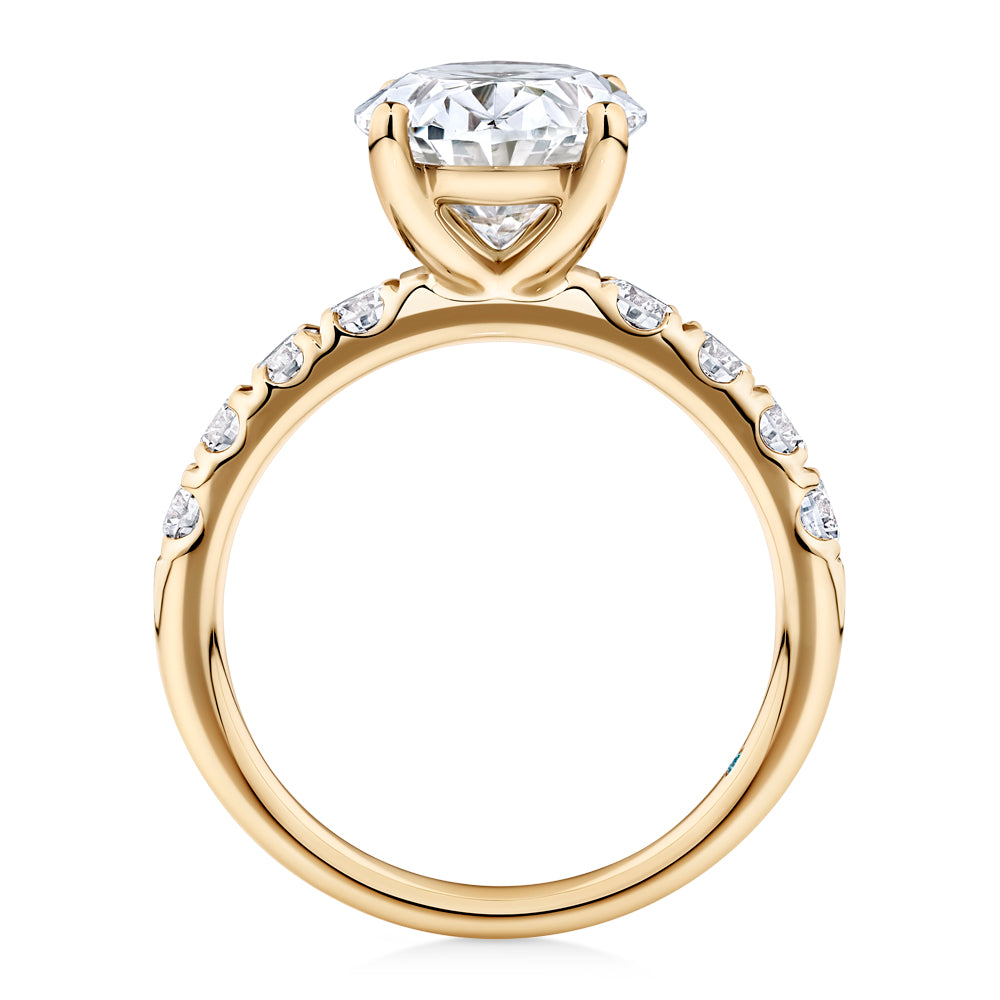 Certified Lab-Grown Diamond, 4.62 carat TW oval and round brilliant shouldered solitaire engagement ring in 14 carat yellow gold