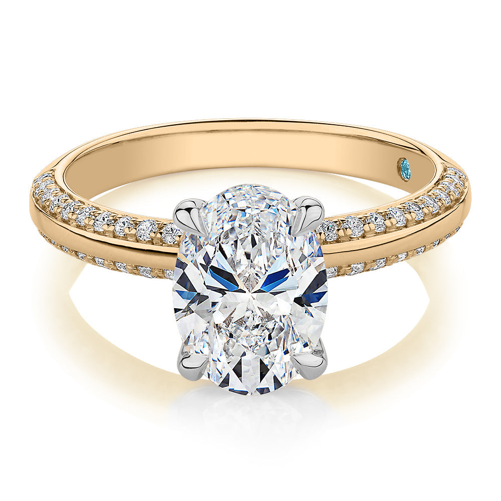 Premium Certified Lab-Grown Diamond 2.24 carat TW oval cut shouldered engagement ring in 14 carat yellow and white gold