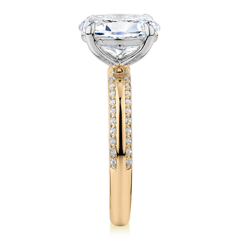 Premium Certified Lab-Grown Diamond 2.24 carat TW oval cut shouldered engagement ring in 14 carat yellow and white gold