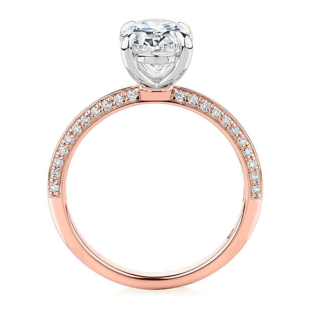 Signature Simulant Diamond 2.24 carat* TW oval cut shouldered engagement ring in 14 carat rose and white gold