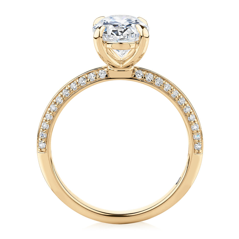 Signature Simulant Diamond 2.24 carat* TW round oval cut engagement ring in 10 carat yellow gold