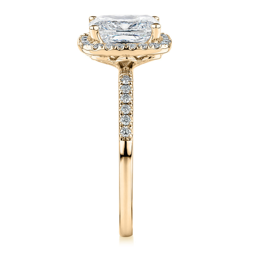 Signature Simulant Diamond 2.23 carat* TW radiant and round brilliant shouldered halo engagement ring in 10 carat yellow gold