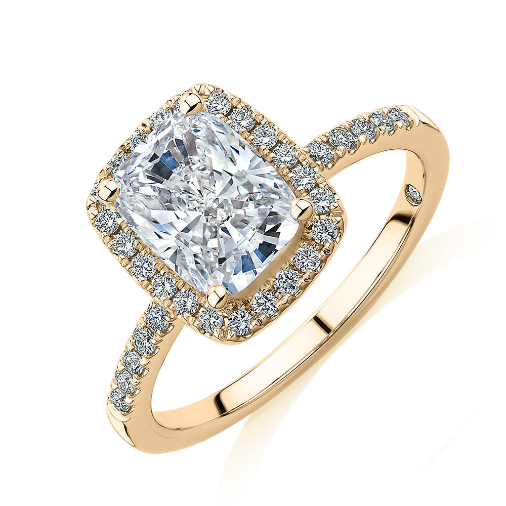 Signature Simulant Diamond 2.23 carat* TW radiant and round brilliant shouldered halo engagement ring in 10 carat yellow gold