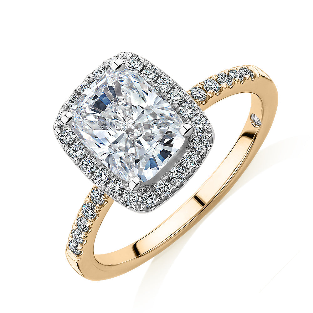 Signature Simulant Diamond 2.23 carat* TW radiant and round brilliant shouldered halo engagement ring in 10 carat yellow and white gold