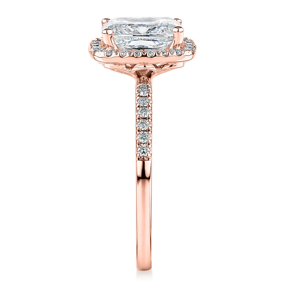 Signature Simulant Diamond 2.23 carat* TW radiant and round brilliant shouldered halo engagement ring in 10 carat rose gold