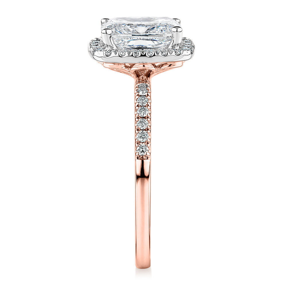 Signature Simulant Diamond 2.23 carat* TW radiant and round brilliant shouldered halo engagement ring in 10 carat rose and white gold