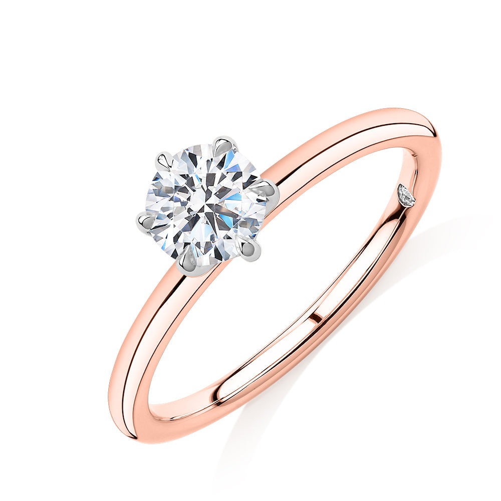 Signature Simulant Diamond 0.70 carat* round brilliant solitaire engagement ring in 14 carat rose and white gold