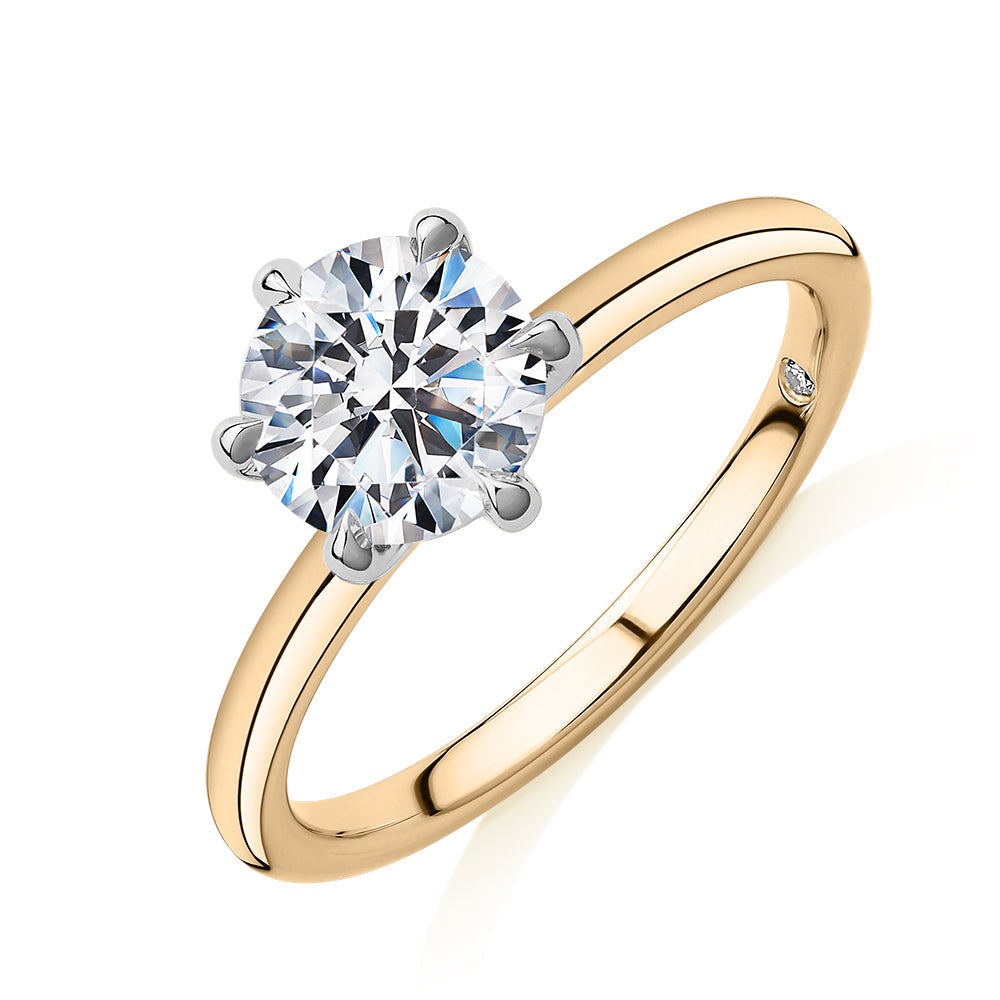 Signature Simulant Diamond 1.50 carat* round brilliant solitaire engagement ring in 10 carat yellow and white gold