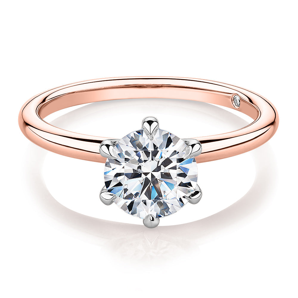 Signature Simulant Diamond 1.50 carat* round brilliant solitaire engagement ring in 10 carat rose and white gold