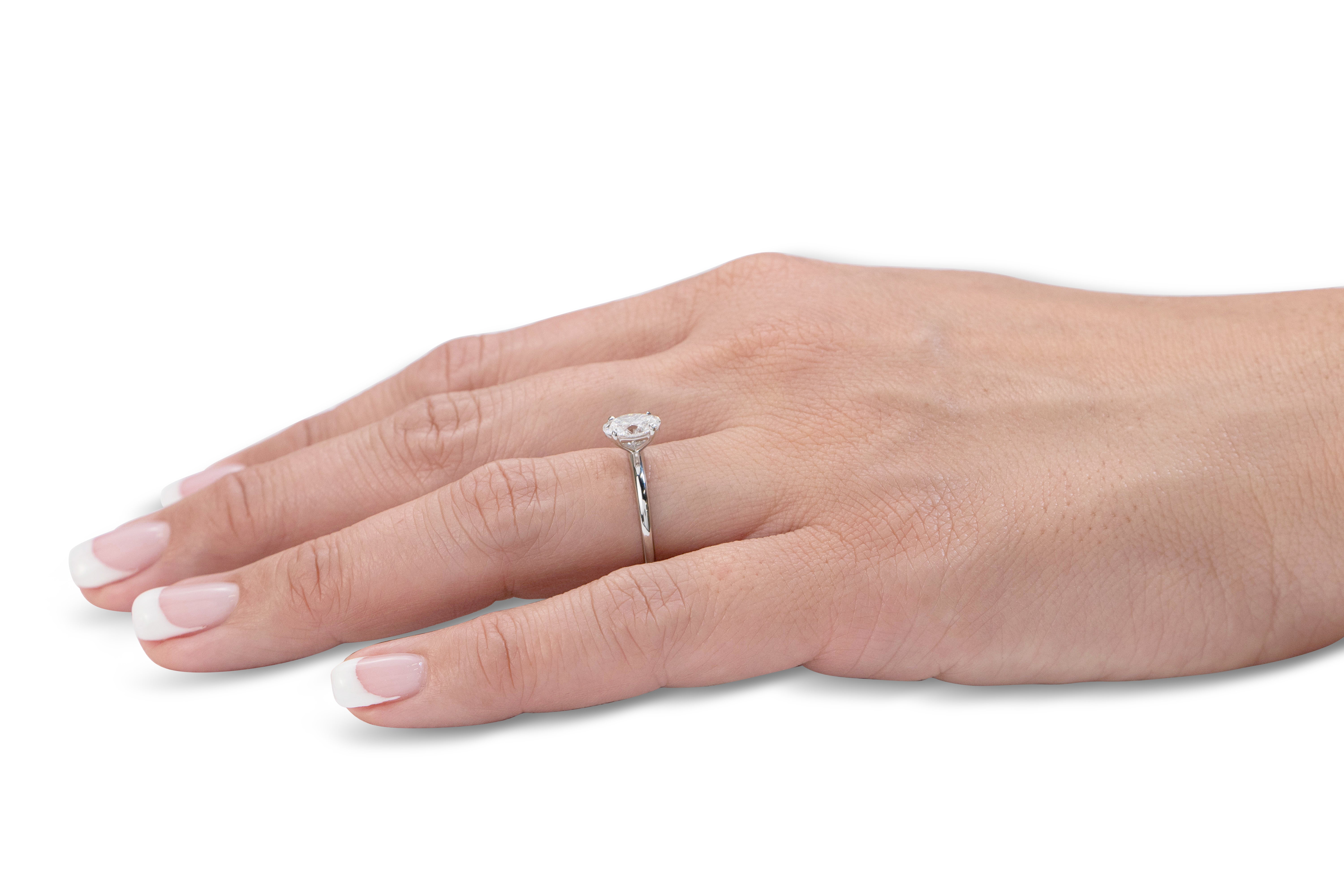 Signature Simulant Diamond 1.00 carat* oval solitaire engagement ring in 10 carat yellow gold
