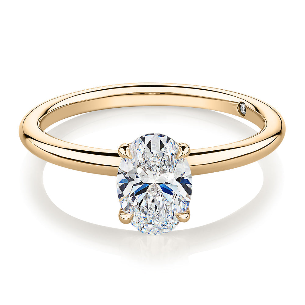 Signature Simulant Diamond 1.00 carat* oval solitaire engagement ring in 10 carat yellow gold