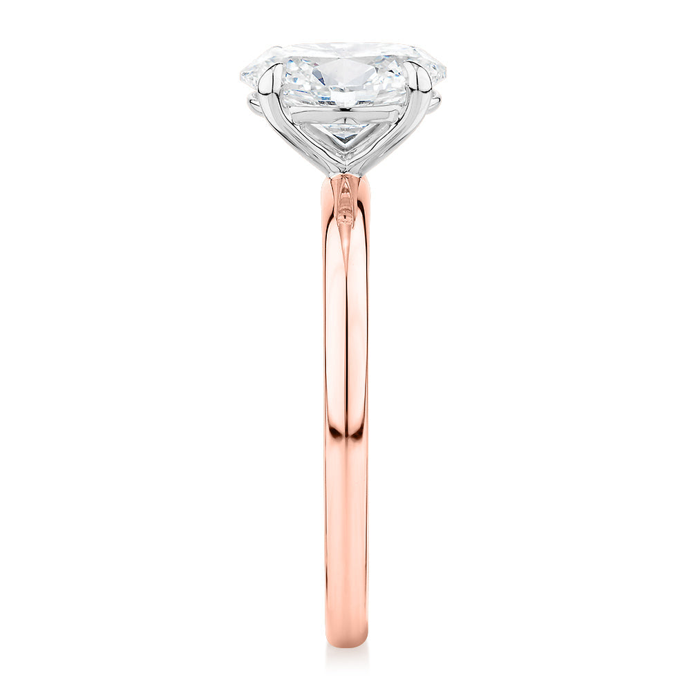 Signature Simulant Diamond 1.50 carat* oval solitaire engagement ring in 10 carat rose and white gold
