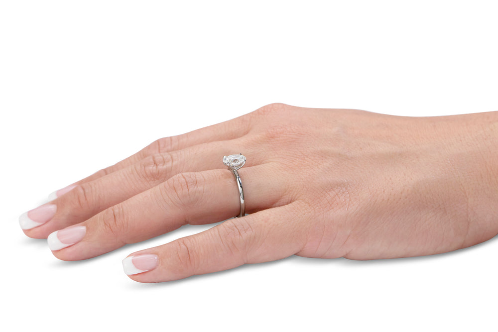Signature Simulant Diamond 1.50 carat* oval solitaire engagement ring in 10 carat rose and white gold