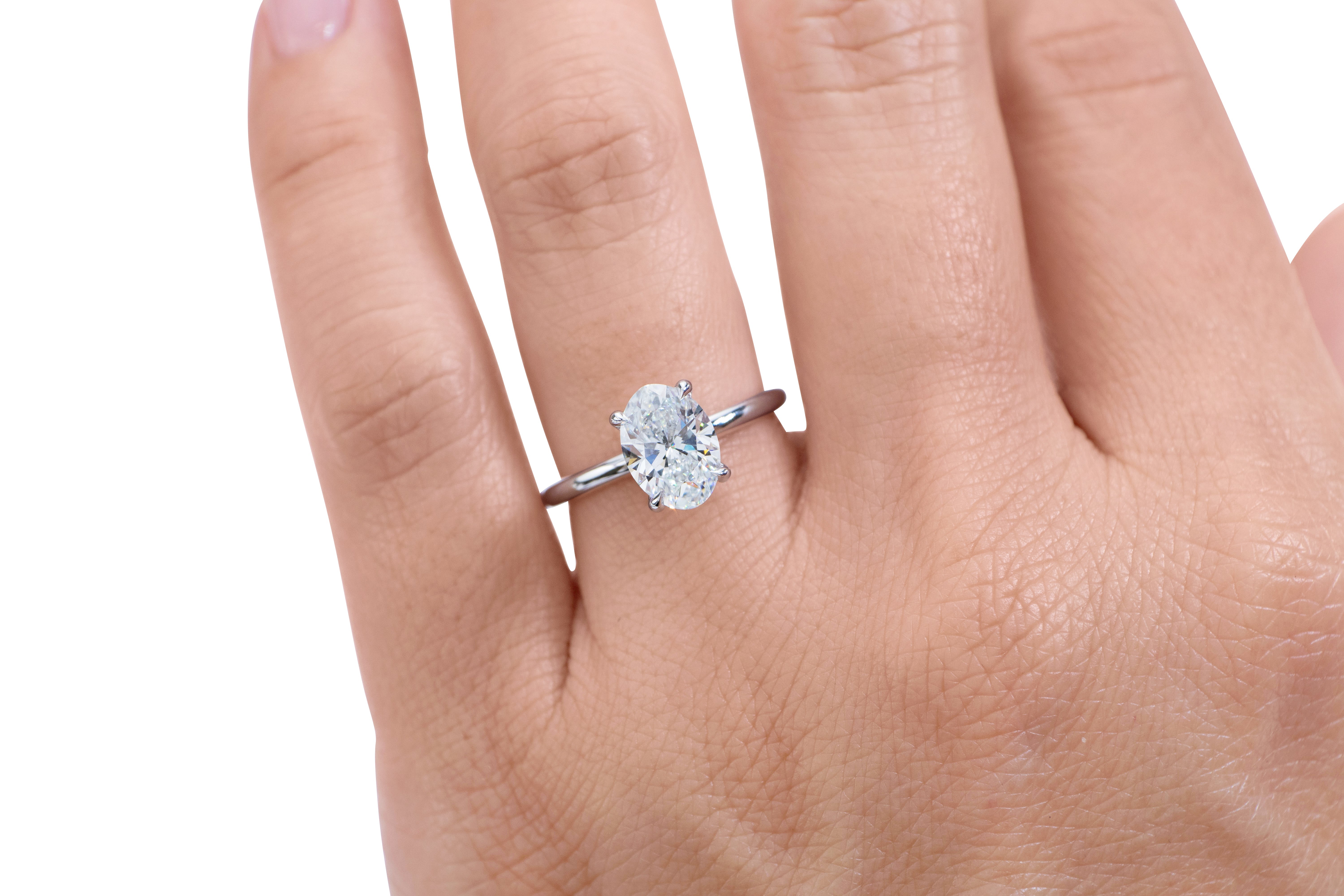 Signature Simulant Diamond 2.00 carat* oval solitaire engagement ring in 10 carat white gold