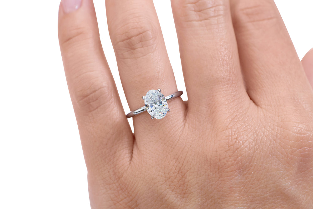 Signature Simulant Diamond 2.00 carat* oval solitaire engagement ring in 10 carat white gold