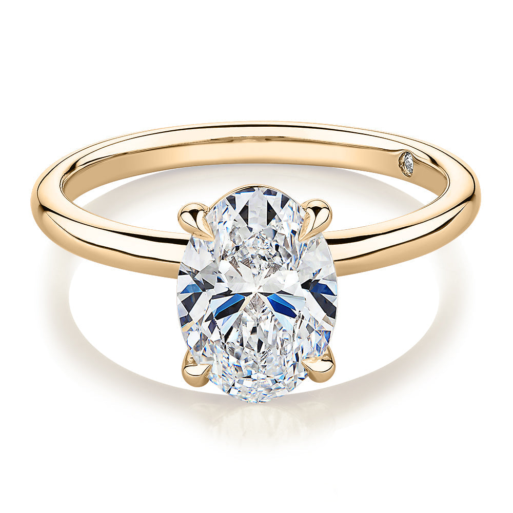 Signature Simulant Diamond 2.00 carat* oval solitaire engagement ring in 10 carat yellow gold