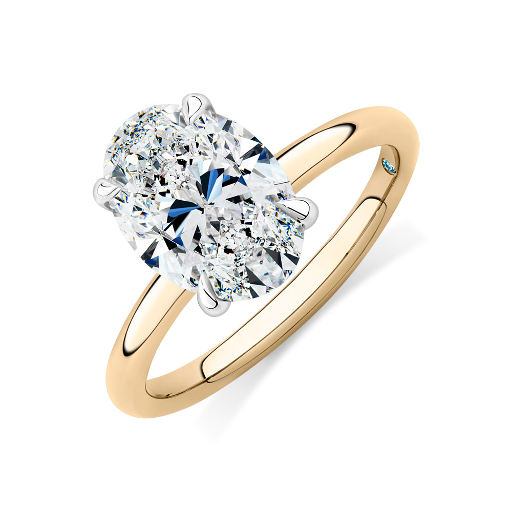 Certified Lab-Grown Diamond, 3 carat oval solitaire engagement ring in 14 carat yellow and white gold