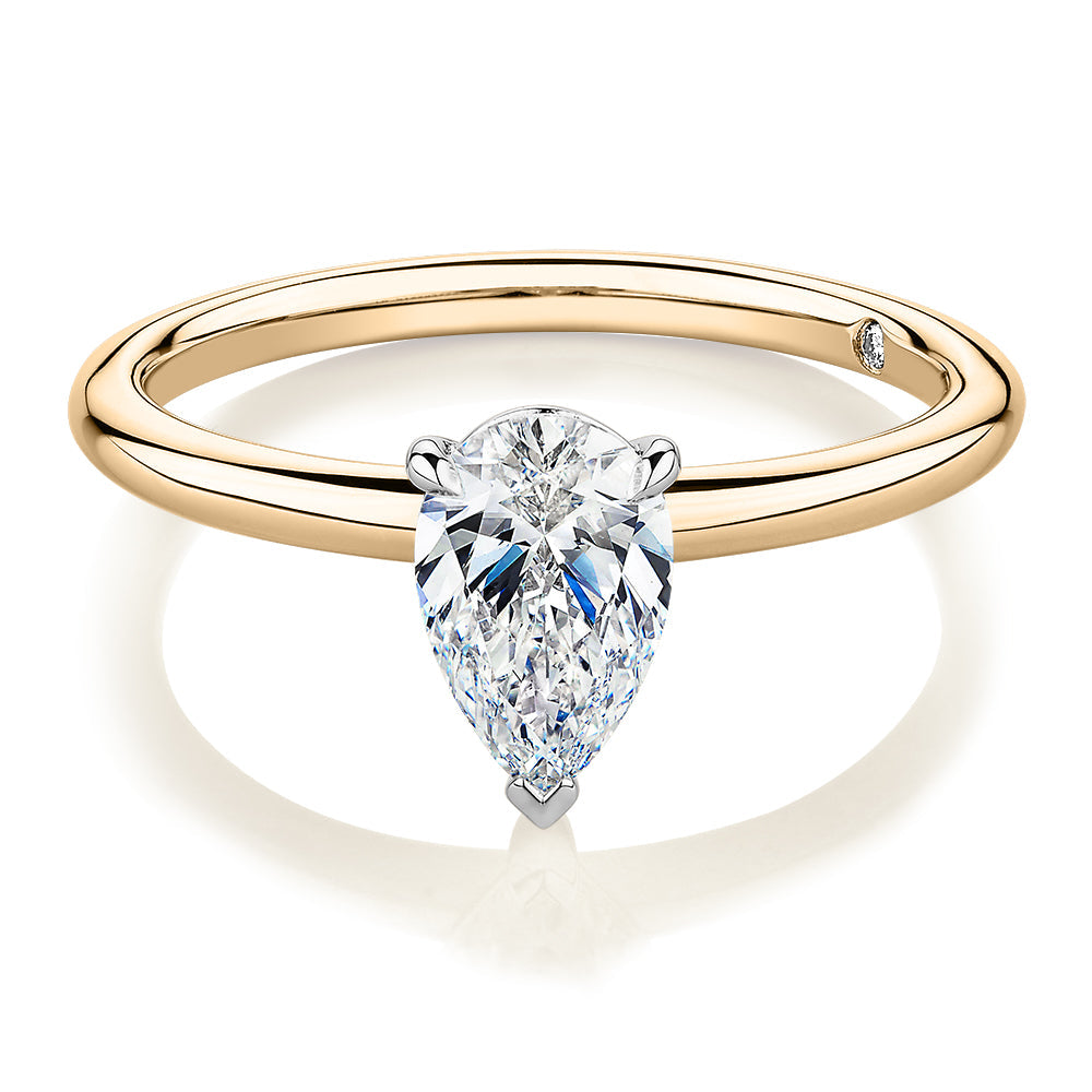 Signature Simulant Diamond 1.00 carat* pear solitaire engagement ring in 10 carat yellow and white gold