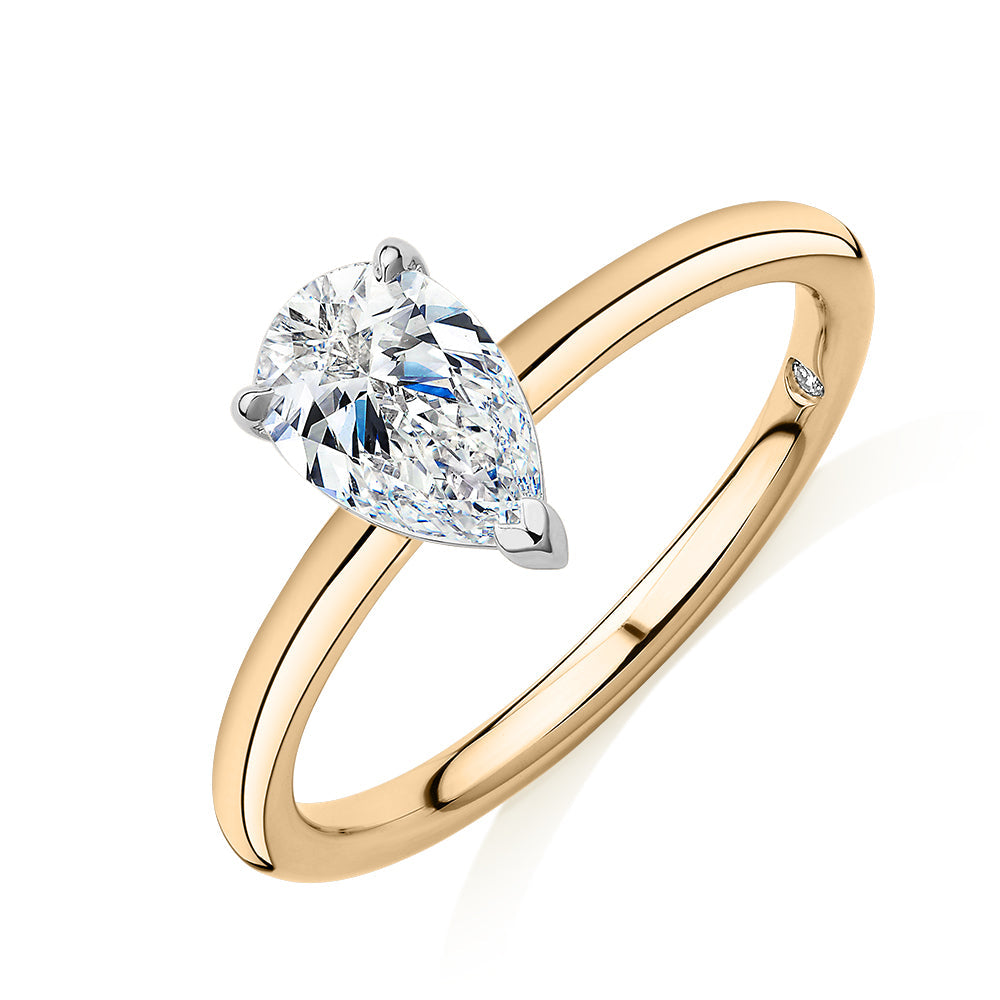 Signature Simulant Diamond 1.00 carat* pear solitaire engagement ring in 10 carat yellow and white gold