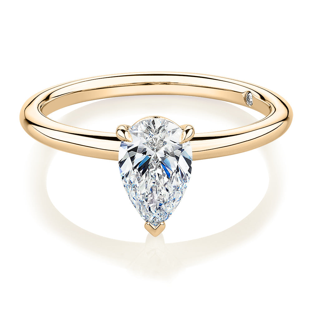 Signature Simulant Diamond 1.00 carat* pear solitaire engagement ring in 10 carat yellow gold
