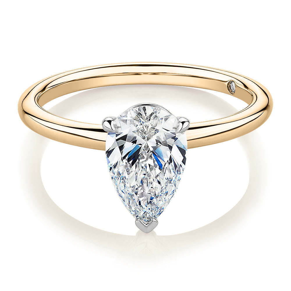 Signature Simulant Diamond 1.50 carat* pear solitaire engagement ring in 10 carat yellow and white gold