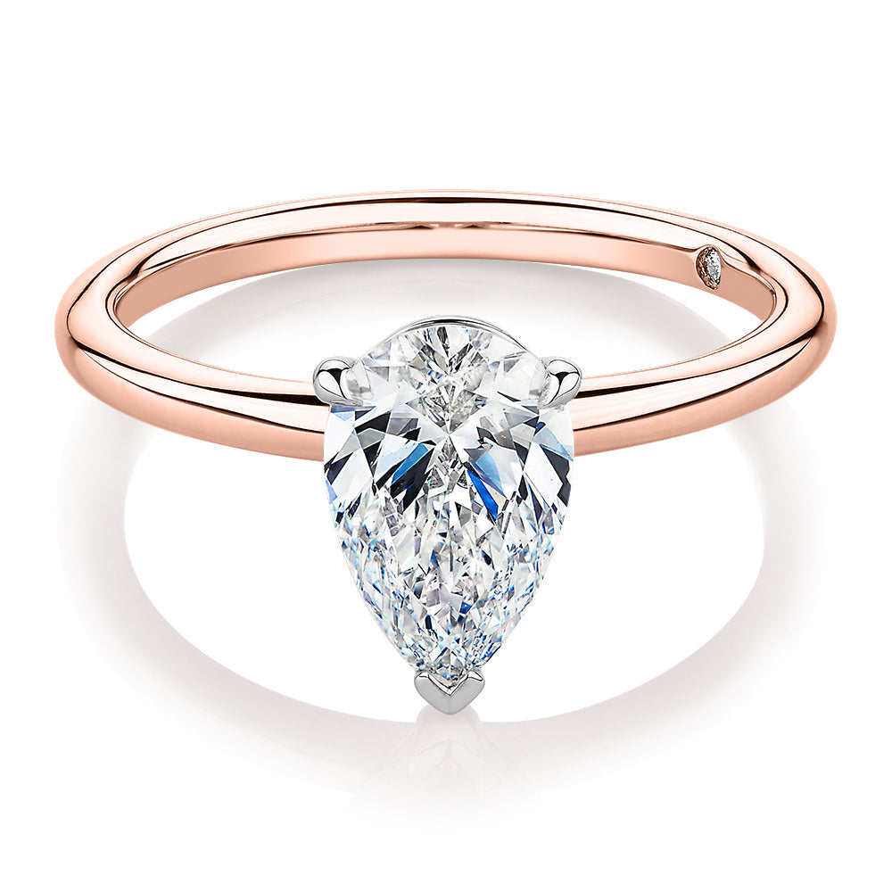Signature Simulant Diamond 1.50 carat* pear solitaire engagement ring in 10 carat rose and white gold