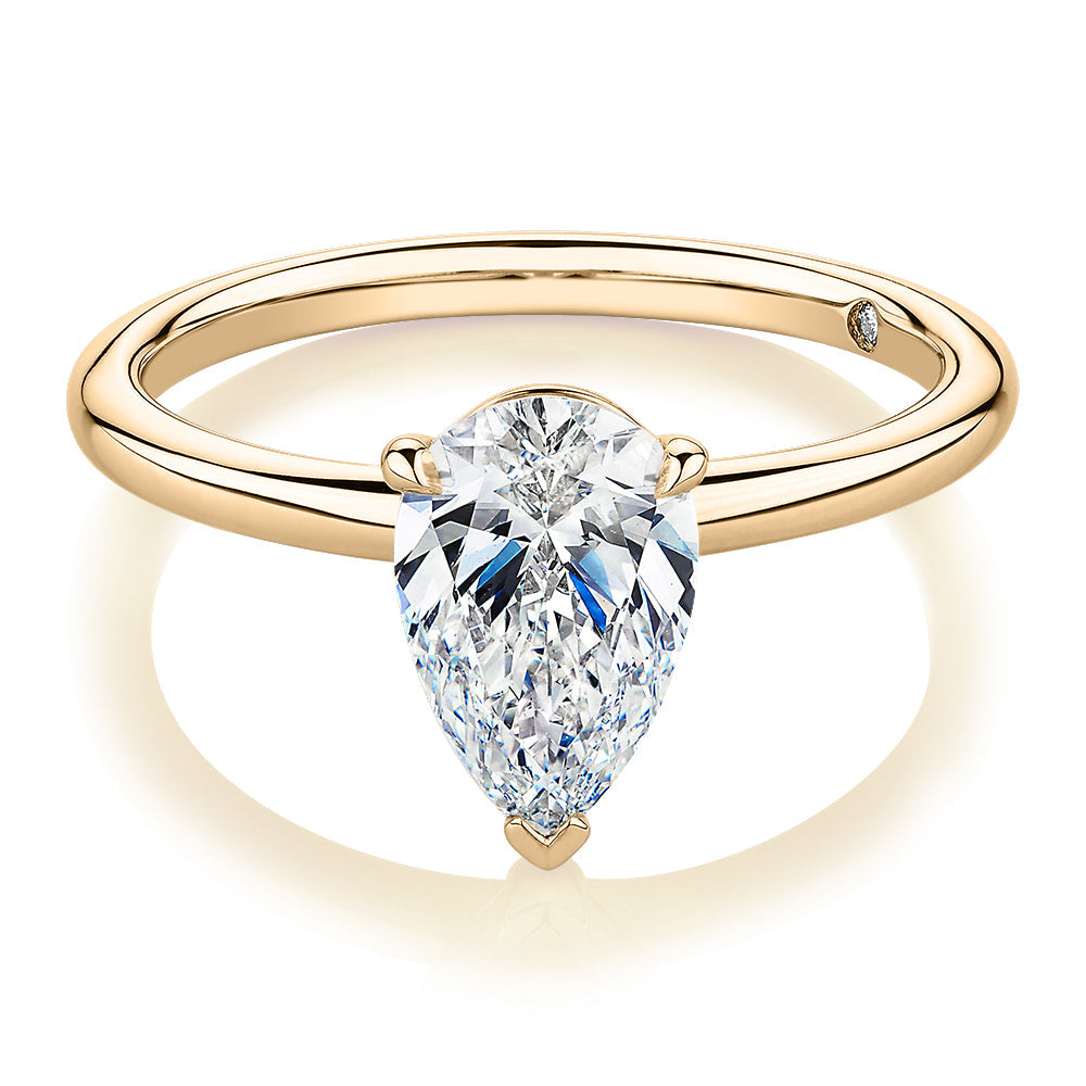 Signature Simulant Diamond 1.50 carat* pear solitaire engagement ring in 10 carat yellow gold