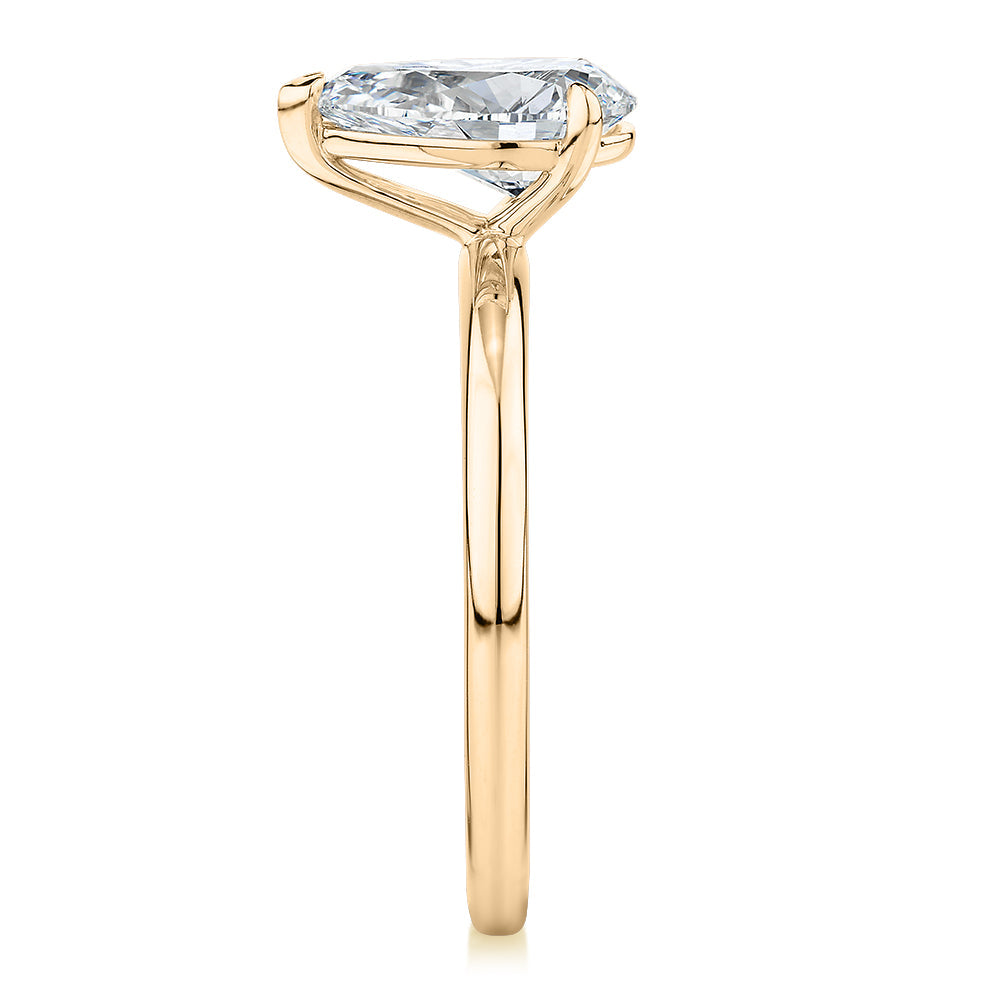 Signature Simulant Diamond 1.50 carat* pear solitaire engagement ring in 10 carat yellow gold