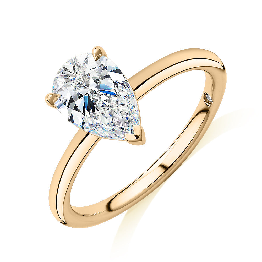 Signature Simulant Diamond 1.50 carat* pear solitaire engagement ring in 10 carat yellow gold