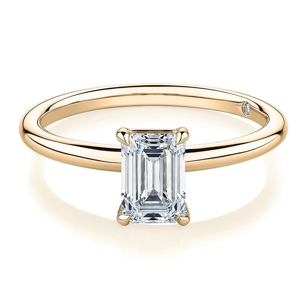 Signature Simulant Diamond 1.00 carat* emerald cut solitaire engagement ring in 10 carat yellow gold