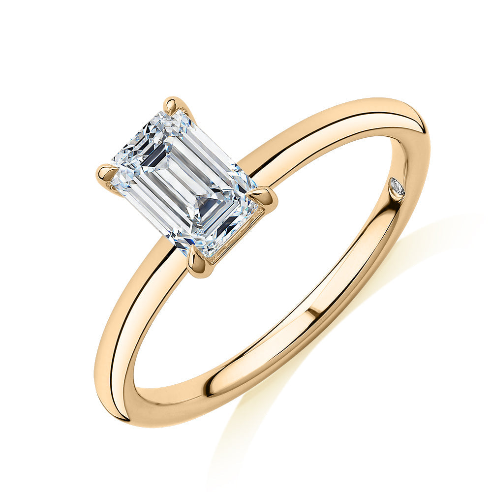 Signature Simulant Diamond 1.00 carat* emerald cut solitaire engagement ring in 10 carat yellow gold