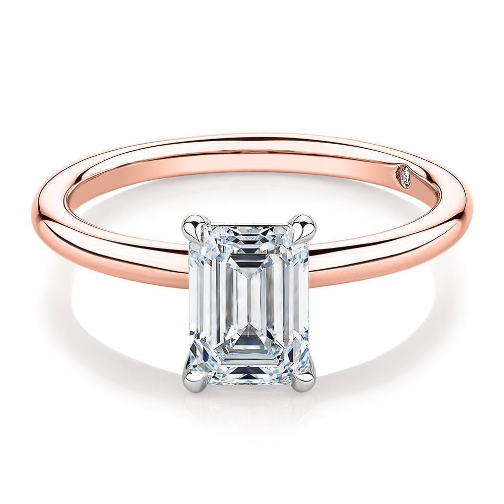Signature Simulant Diamond 1.50 carat* emerald cut solitaire engagement ring in 10 carat rose and white gold