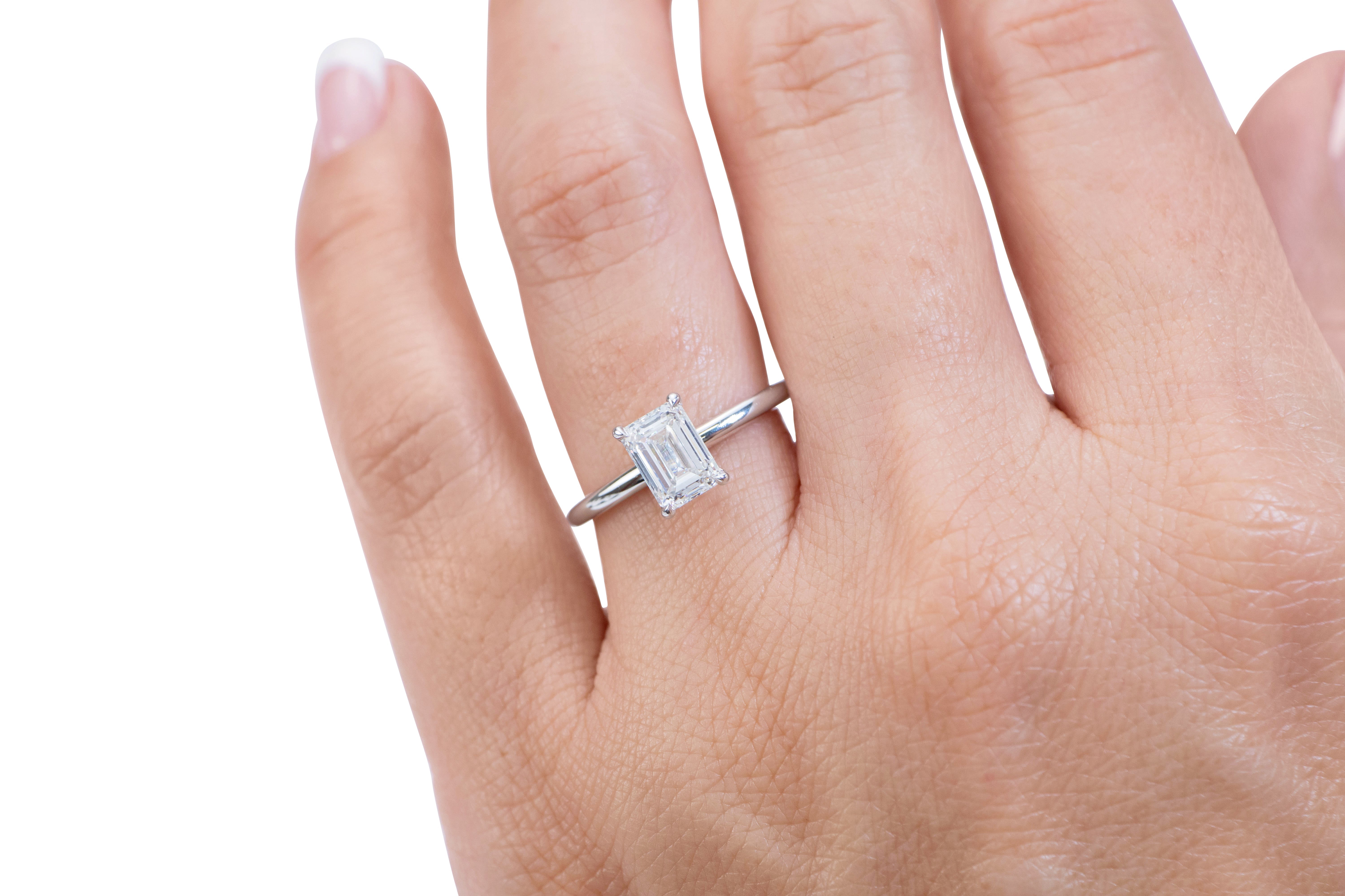 Signature Simulant Diamond 1.50 carat* emerald cut solitaire engagement ring in 10 carat yellow gold