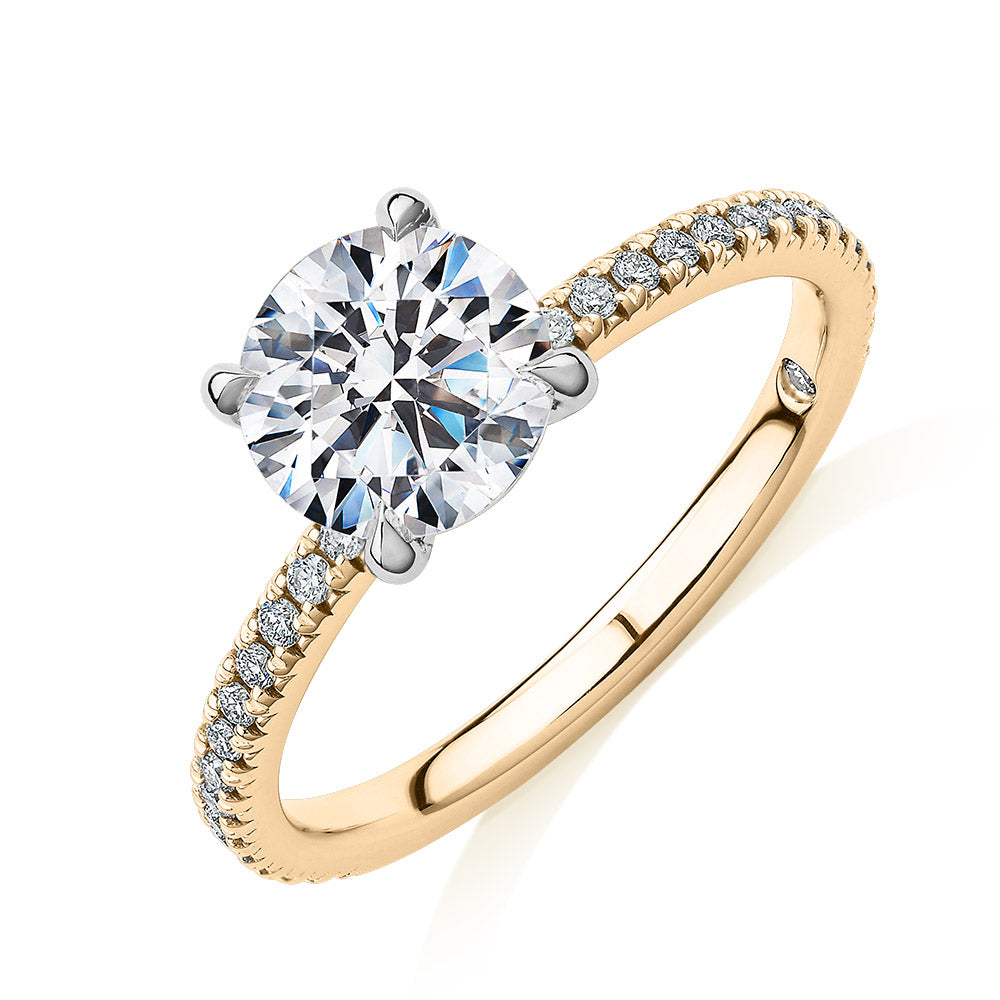 Signature Simulant Diamond 1.74 carat* TW round brilliant shouldered engagement ring in 10 carat yellow and white gold