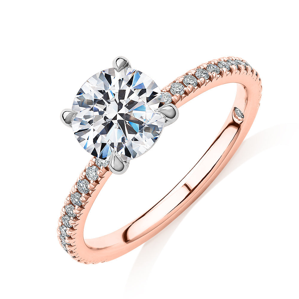 Signature Simulant Diamond 1.74 carat* TW round brilliant shouldered engagement ring in 10 carat rose and white gold