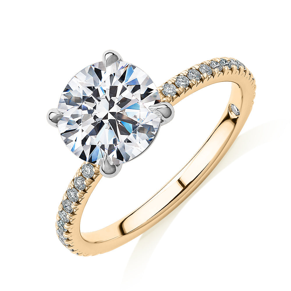 Signature Simulant Diamond 2.19 carat* TW round brilliant shouldered engagement ring in 10 carat yellow and white gold