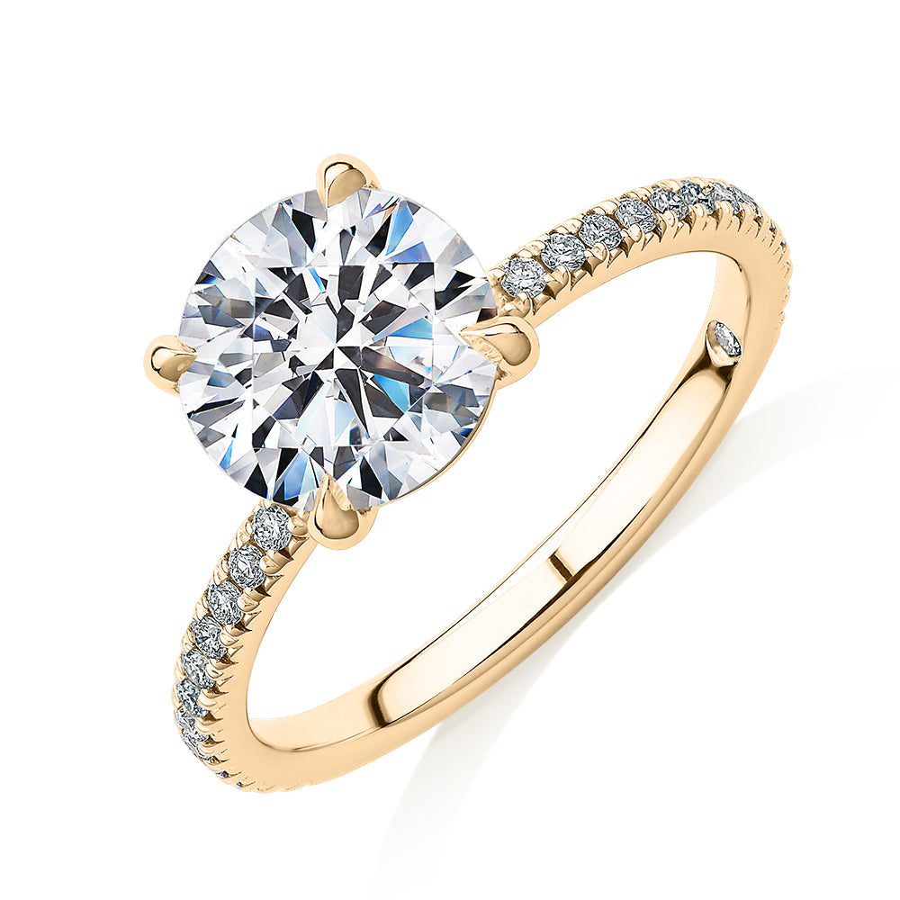 Signature Simulant Diamond 2.19 carat* TW round brilliant shouldered engagement ring in 10 carat yellow gold