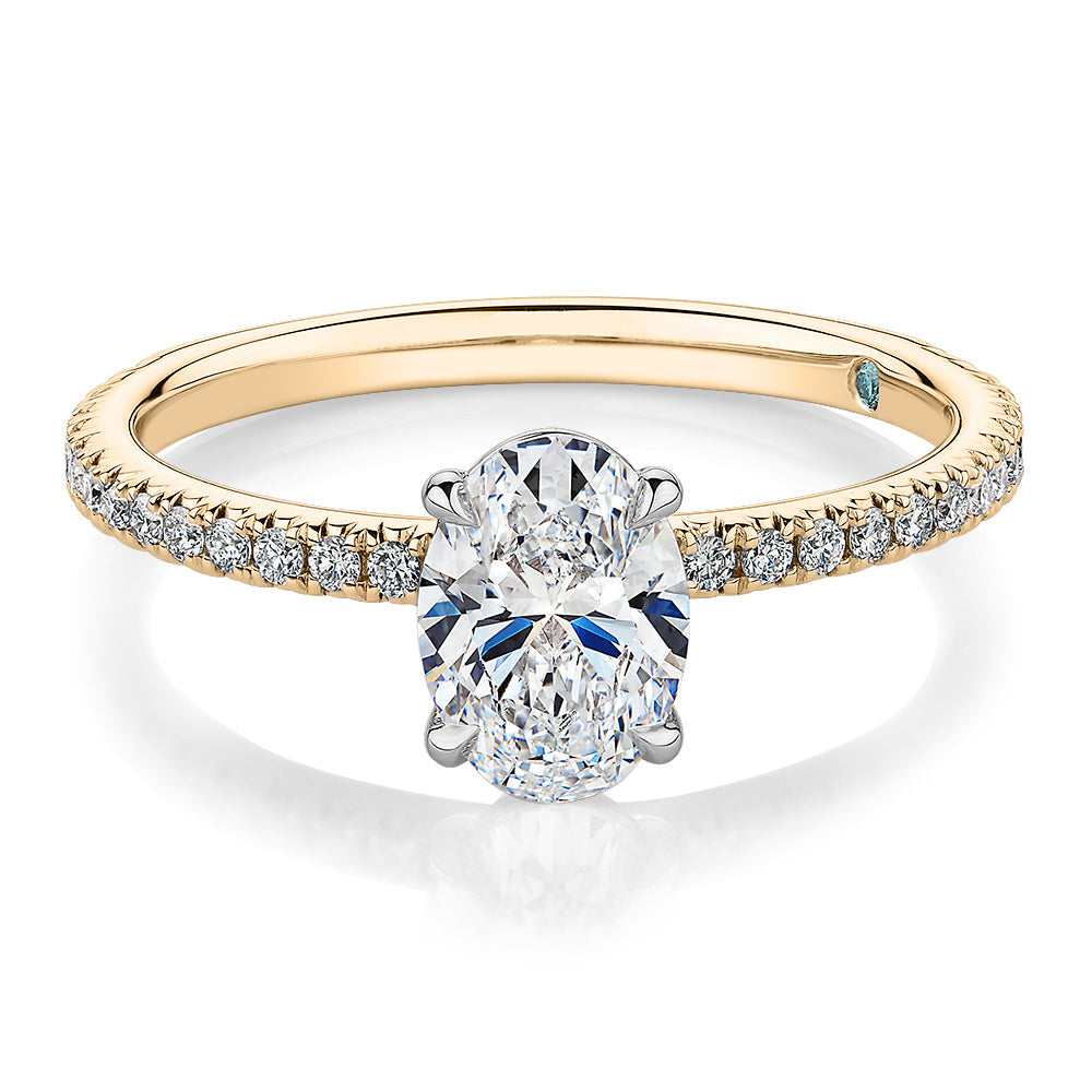 Premium Certified Laboratory Created Diamond, 1.24 carat TW oval and round brilliant shouldered engagement ring in 18 carat yellow and white gold